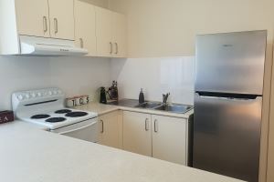 The Kitchen of Mayfield Short Stay Apartments.