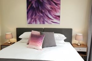 One of the Bedrooms at Mayfield Short Stay Apartments.
