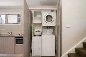 The Laundry of a 2 Bedroom Townhouse Apartment at Birmingham Gardens Townhouses.