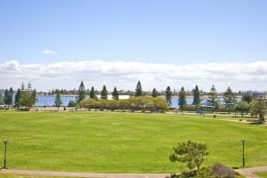 The Flagstaff apartment features a private balcony with 180 degree views over Foreshore Park.