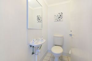 Sandbar Apartment provides a second toilet on the downstairs living space.